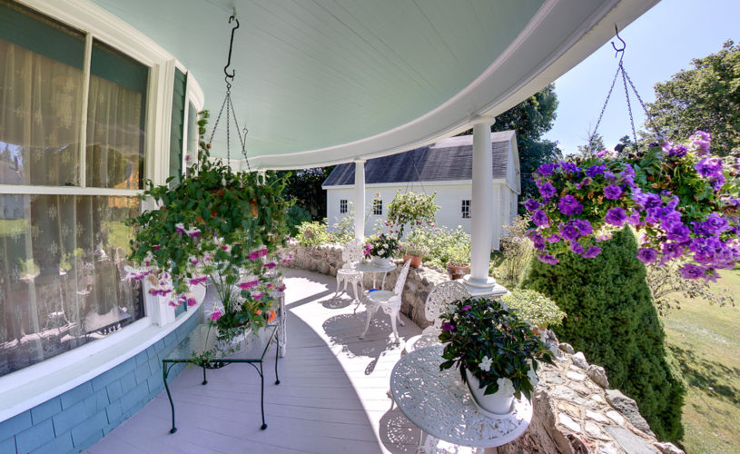 jeweled turret inn veranda with flowers